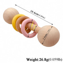 Load image into Gallery viewer, 3 Rings Teething Chew Rattle on The Bed